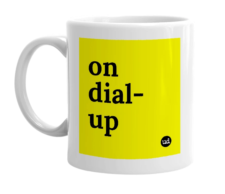 White mug with 'on dial-up' in bold black letters