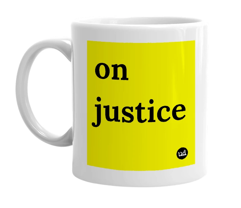 White mug with 'on justice' in bold black letters