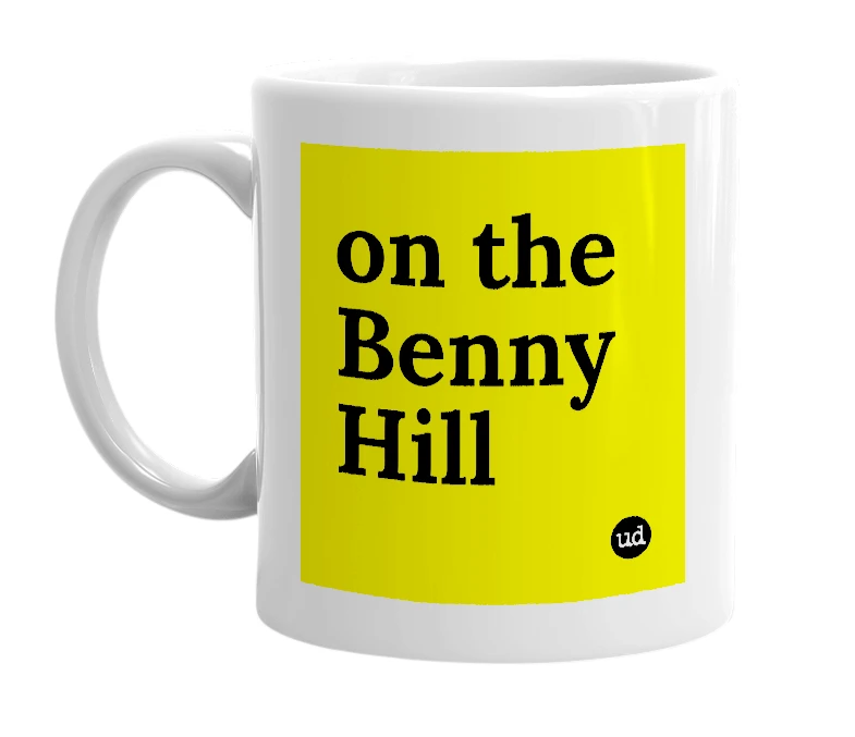 White mug with 'on the Benny Hill' in bold black letters