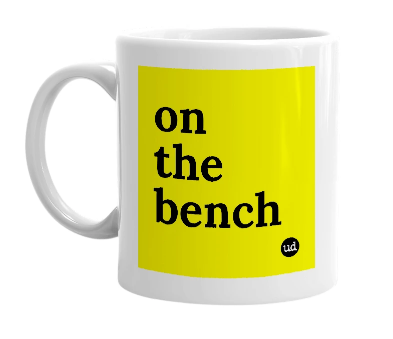 White mug with 'on the bench' in bold black letters