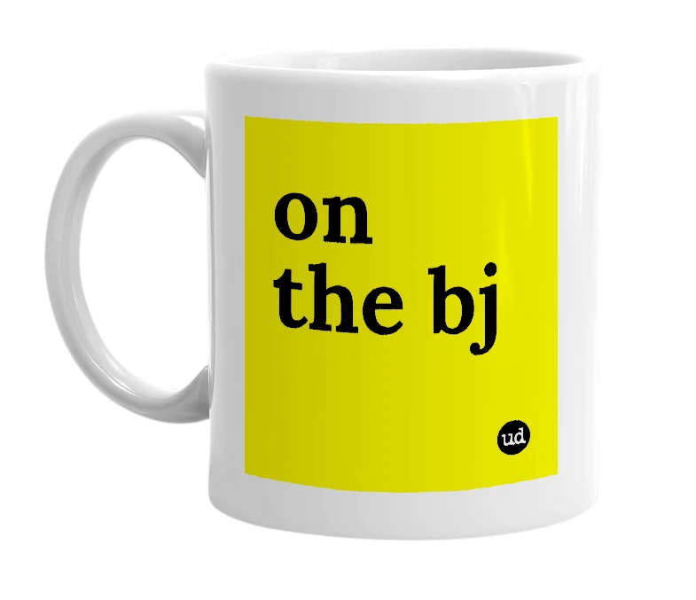 White mug with 'on the bj' in bold black letters