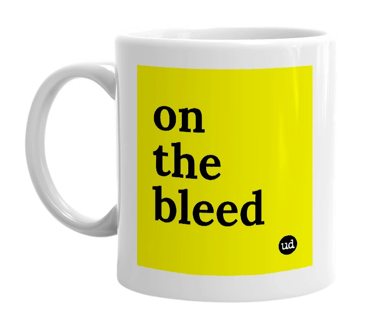 White mug with 'on the bleed' in bold black letters