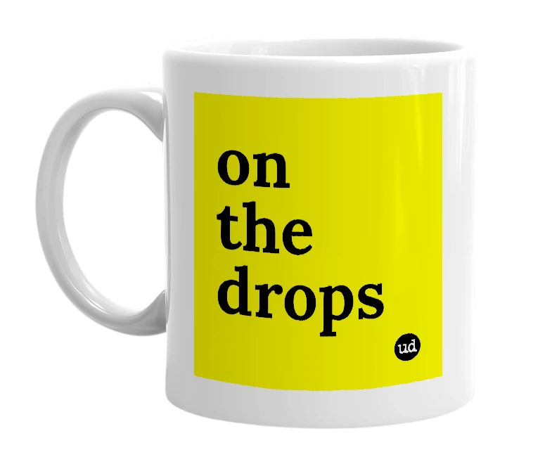 White mug with 'on the drops' in bold black letters