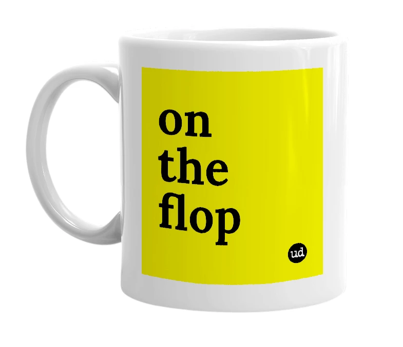 White mug with 'on the flop' in bold black letters