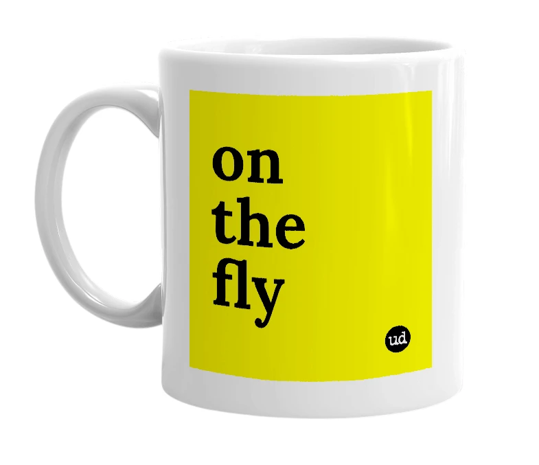 White mug with 'on the fly' in bold black letters