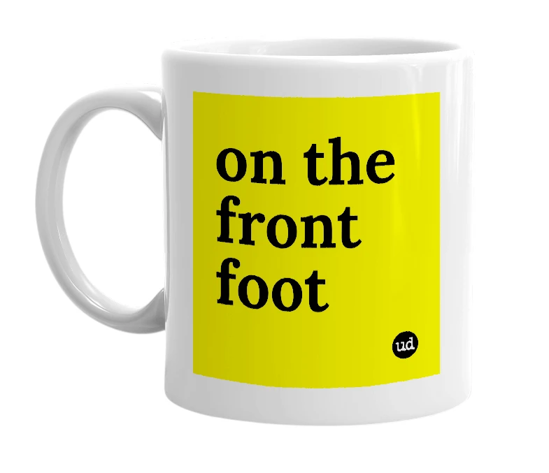White mug with 'on the front foot' in bold black letters