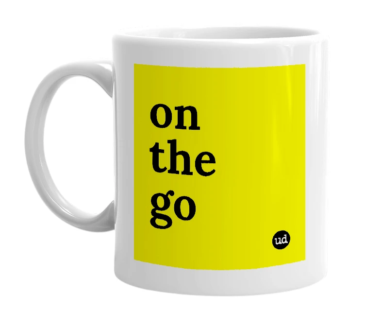 White mug with 'on the go' in bold black letters