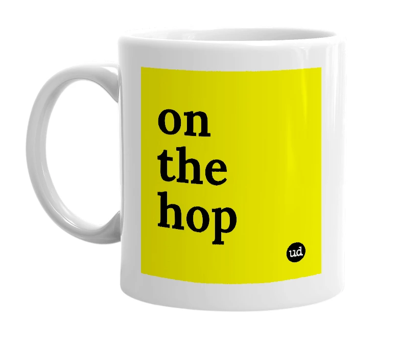 White mug with 'on the hop' in bold black letters