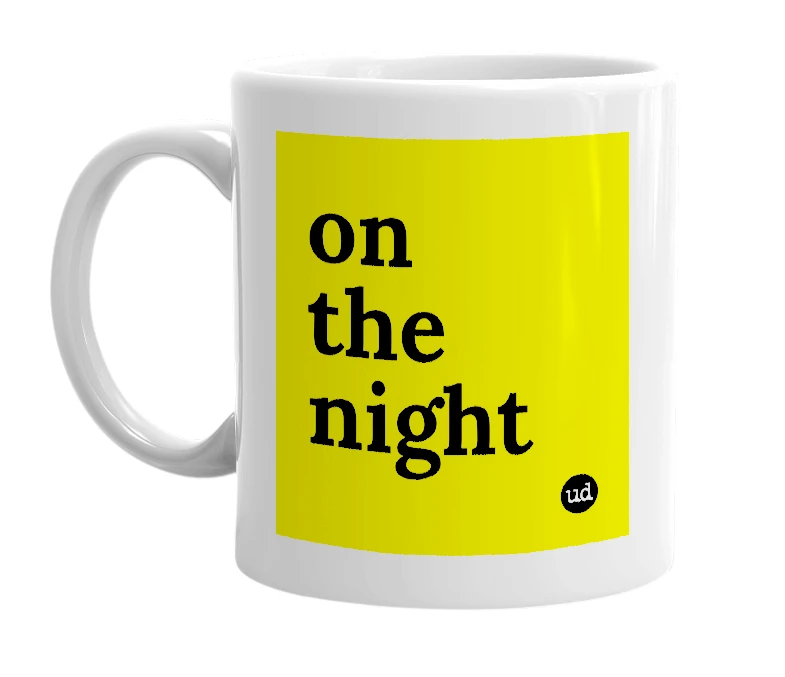 White mug with 'on the night' in bold black letters