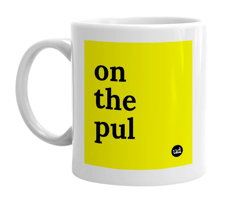 White mug with 'on the pul' in bold black letters