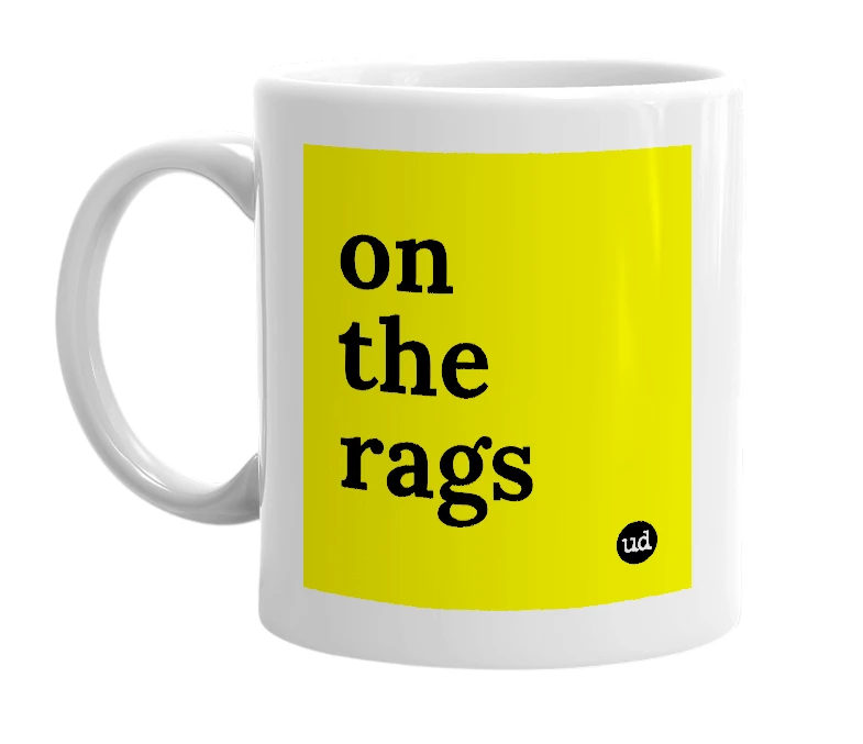 White mug with 'on the rags' in bold black letters