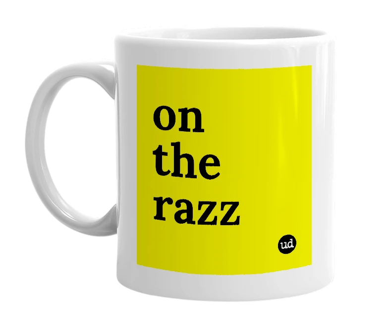 White mug with 'on the razz' in bold black letters