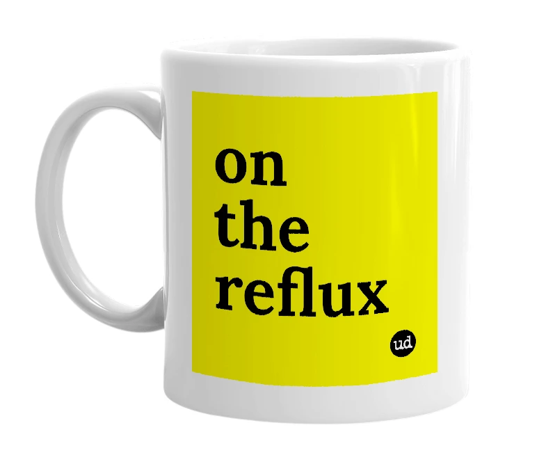 White mug with 'on the reflux' in bold black letters