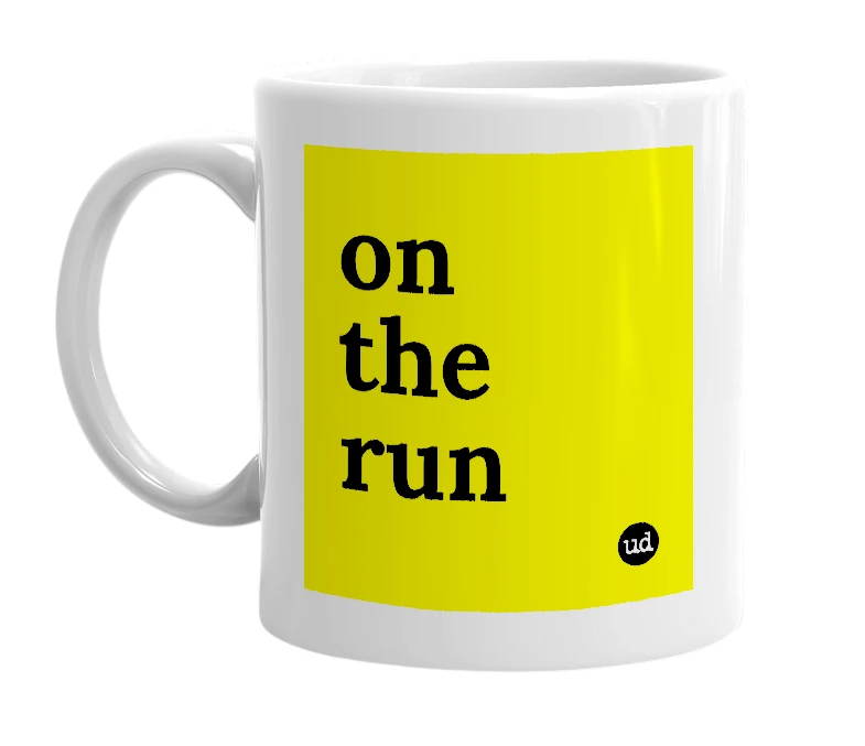 White mug with 'on the run' in bold black letters