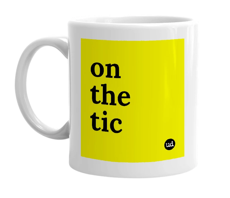 White mug with 'on the tic' in bold black letters