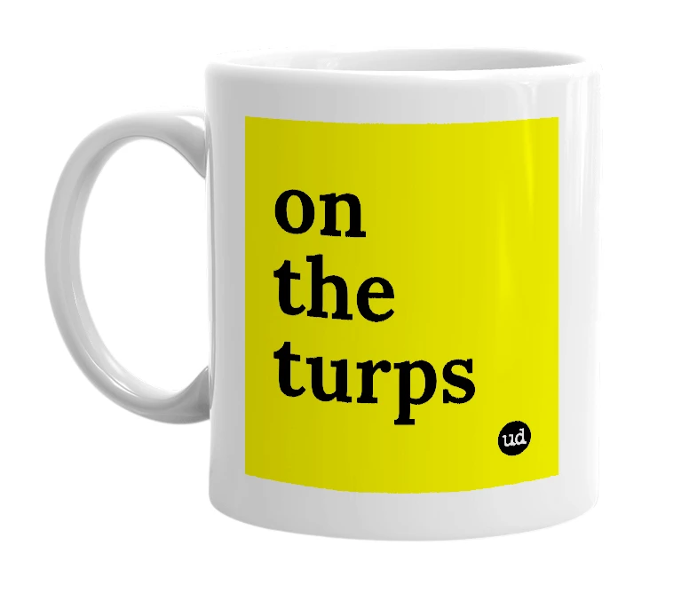 White mug with 'on the turps' in bold black letters