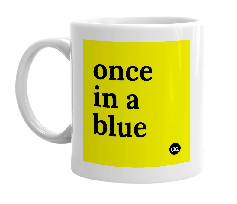 White mug with 'once in a blue' in bold black letters