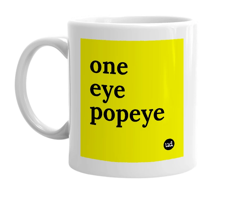 White mug with 'one eye popeye' in bold black letters