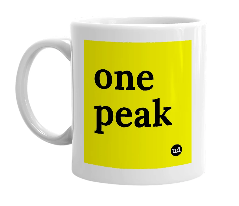 White mug with 'one peak' in bold black letters