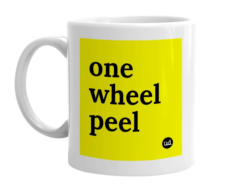 White mug with 'one wheel peel' in bold black letters