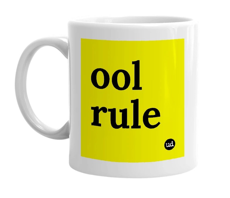 White mug with 'ool rule' in bold black letters