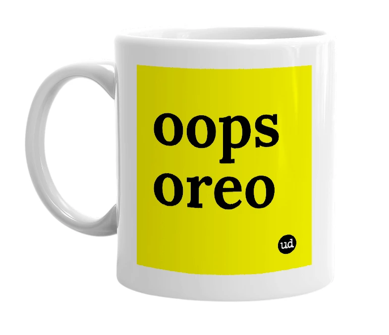 White mug with 'oops oreo' in bold black letters