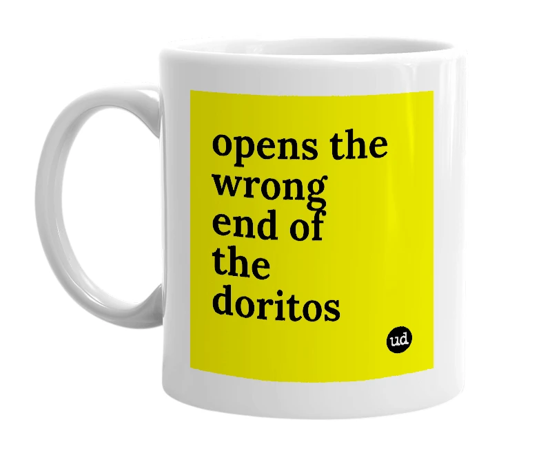 White mug with 'opens the wrong end of the doritos' in bold black letters