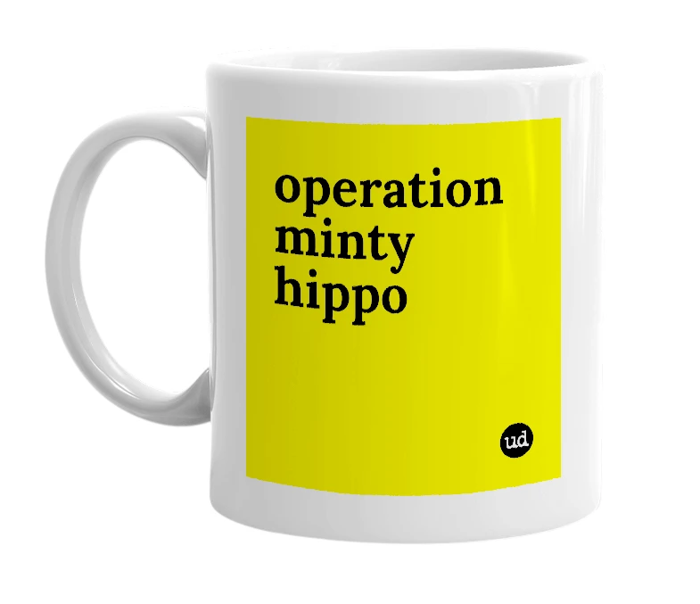 White mug with 'operation minty hippo' in bold black letters