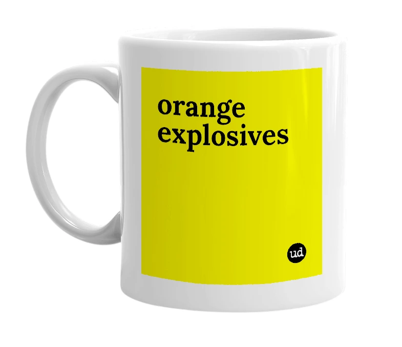 White mug with 'orange explosives' in bold black letters