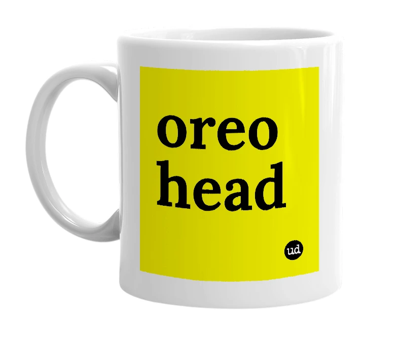 White mug with 'oreo head' in bold black letters