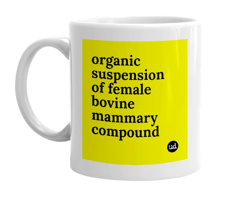 White mug with 'organic suspension of female bovine mammary compound' in bold black letters