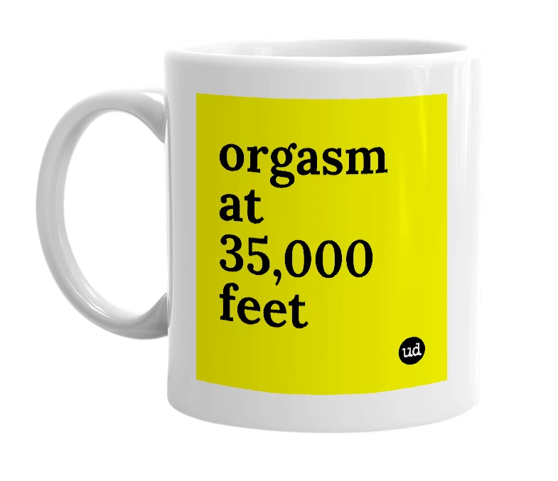White mug with 'orgasm at 35,000 feet' in bold black letters