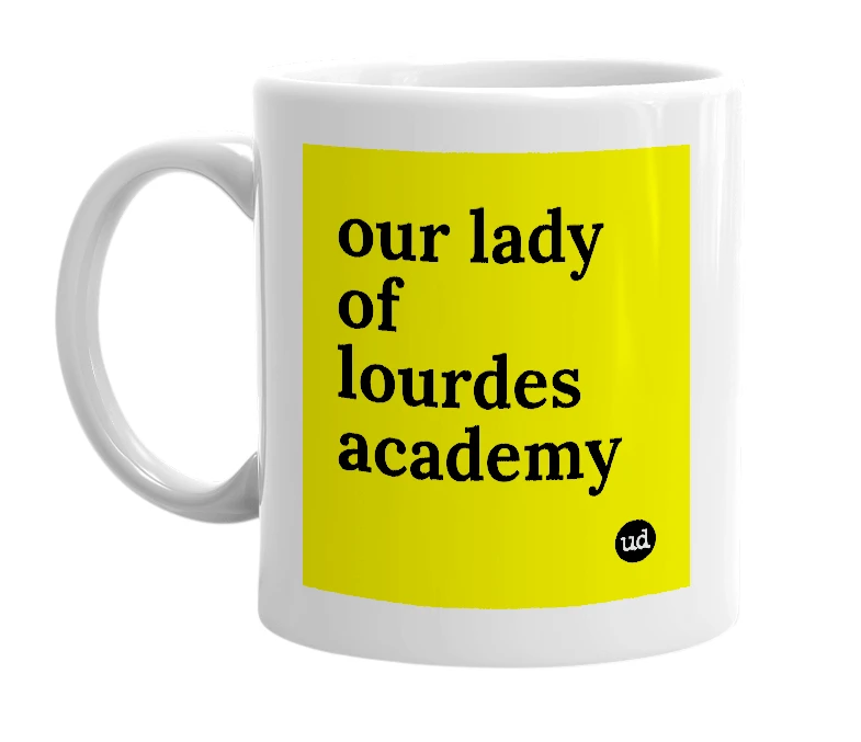 White mug with 'our lady of lourdes academy' in bold black letters