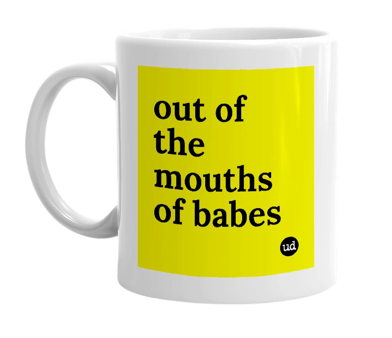 White mug with 'out of the mouths of babes' in bold black letters