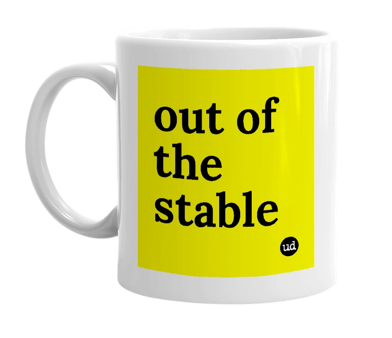 White mug with 'out of the stable' in bold black letters