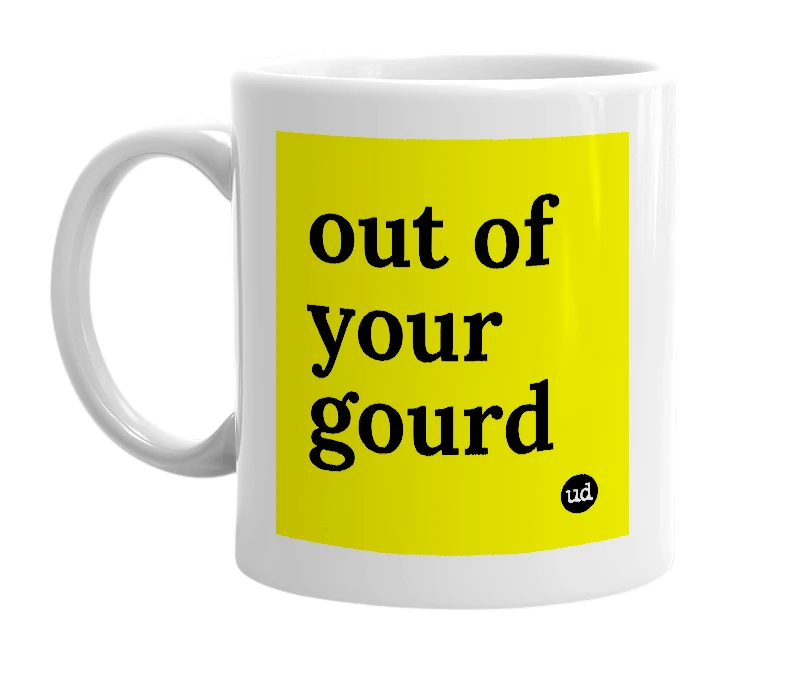 White mug with 'out of your gourd' in bold black letters