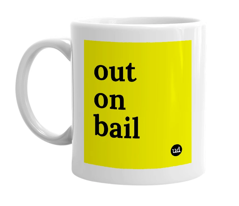 White mug with 'out on bail' in bold black letters