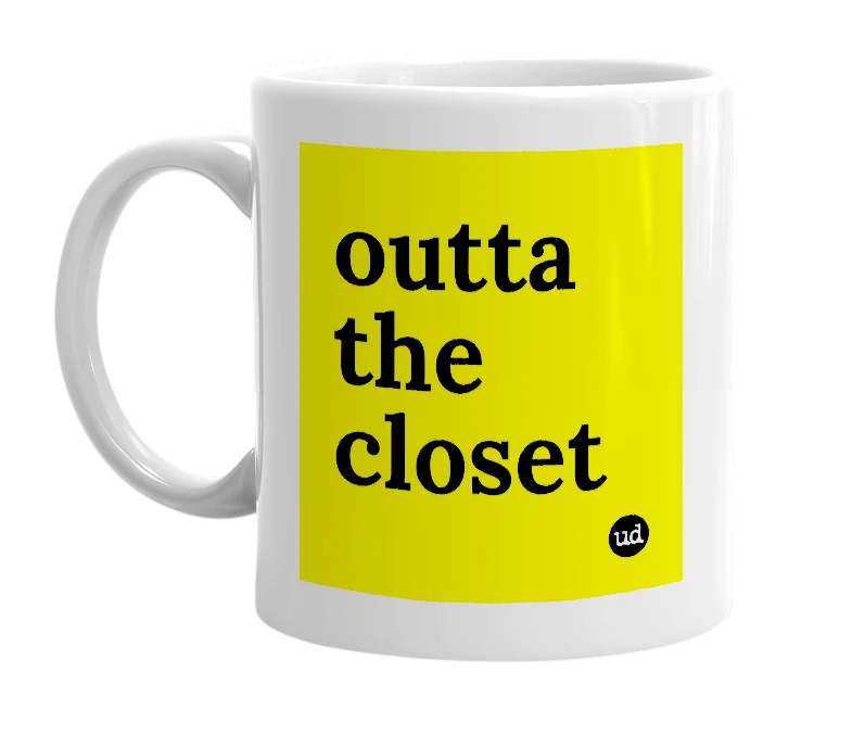 White mug with 'outta the closet' in bold black letters
