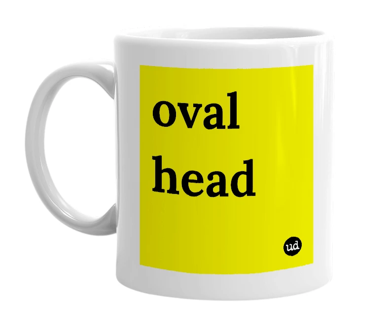 White mug with 'oval head' in bold black letters