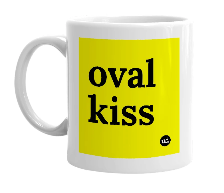 White mug with 'oval kiss' in bold black letters