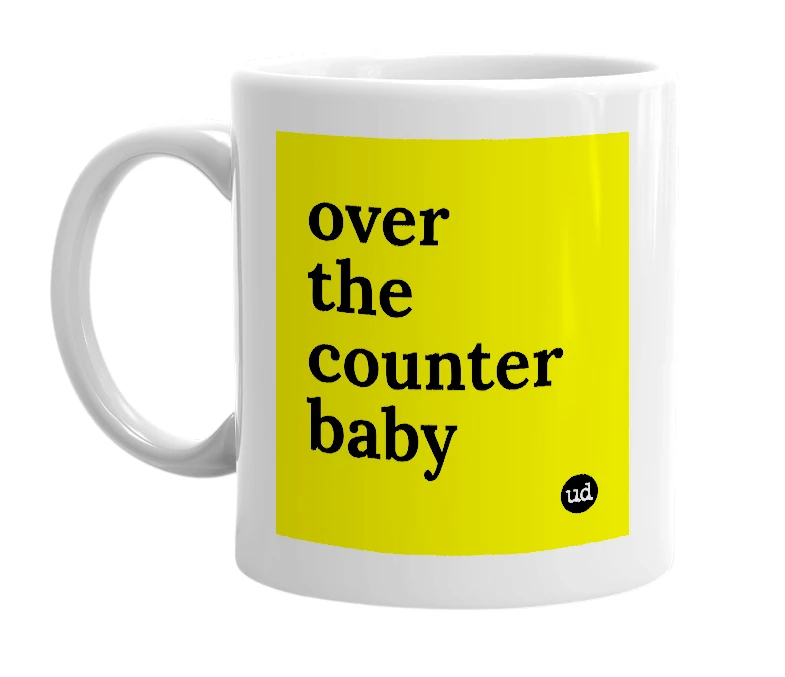 White mug with 'over the counter baby' in bold black letters