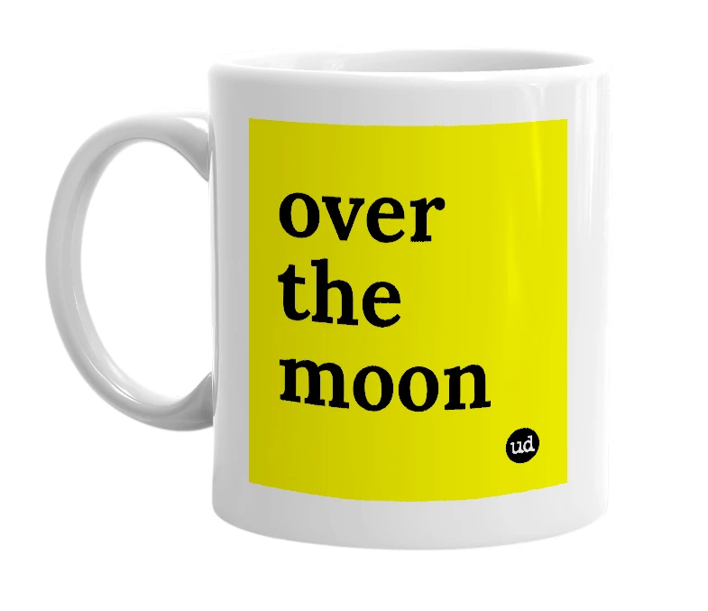 White mug with 'over the moon' in bold black letters