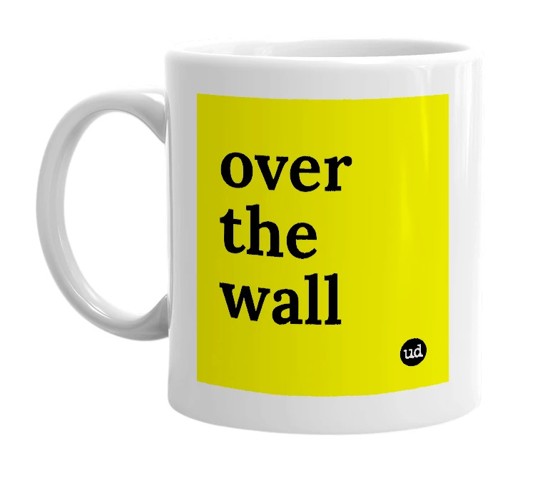 White mug with 'over the wall' in bold black letters