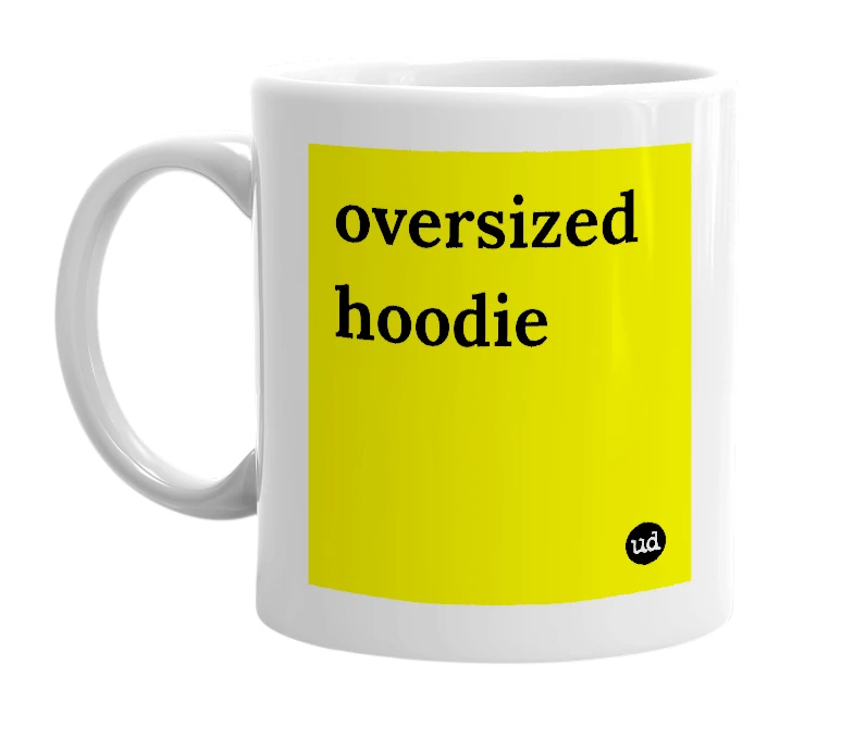 White mug with 'oversized hoodie' in bold black letters