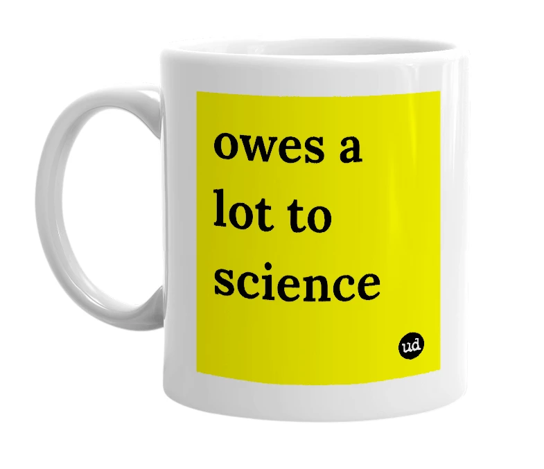 White mug with 'owes a lot to science' in bold black letters