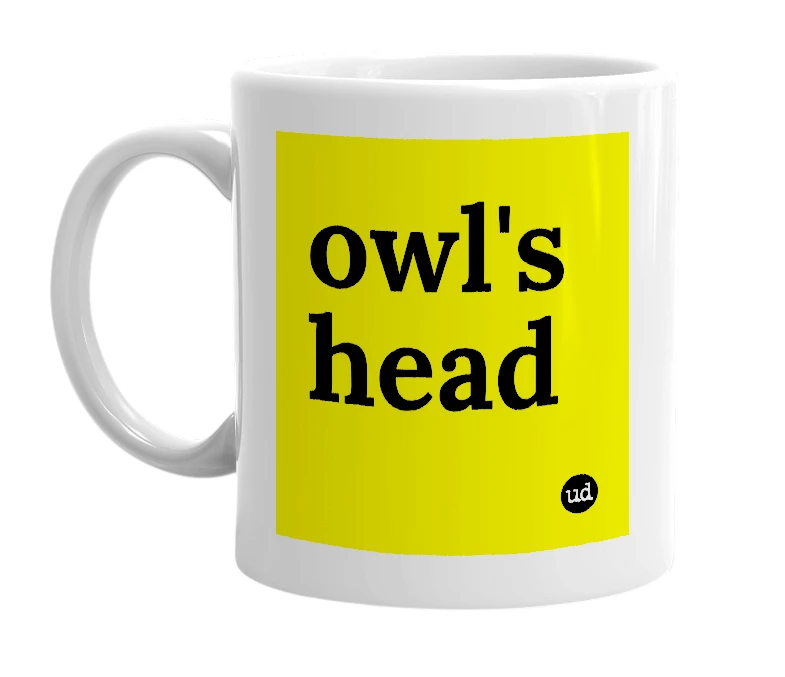 White mug with 'owl's head' in bold black letters