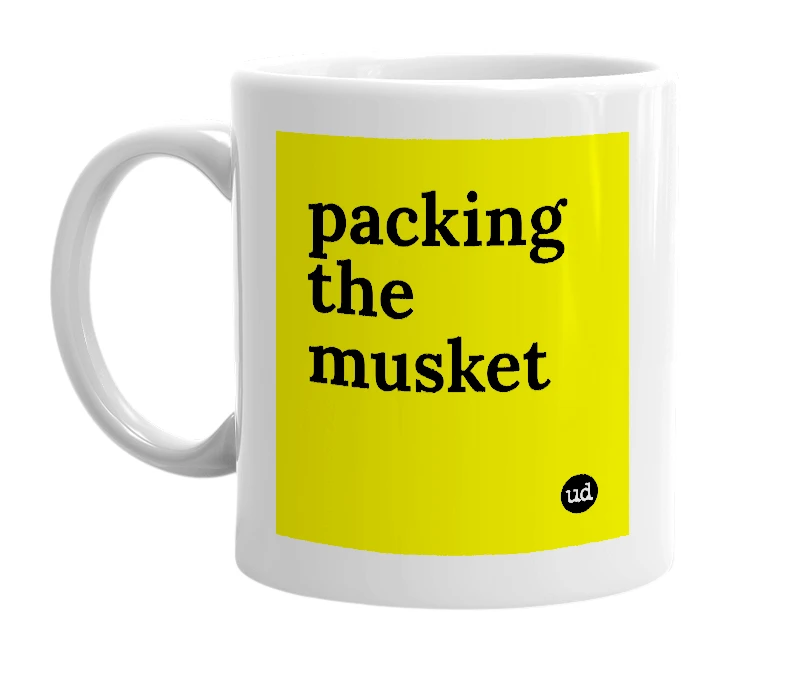 White mug with 'packing the musket' in bold black letters