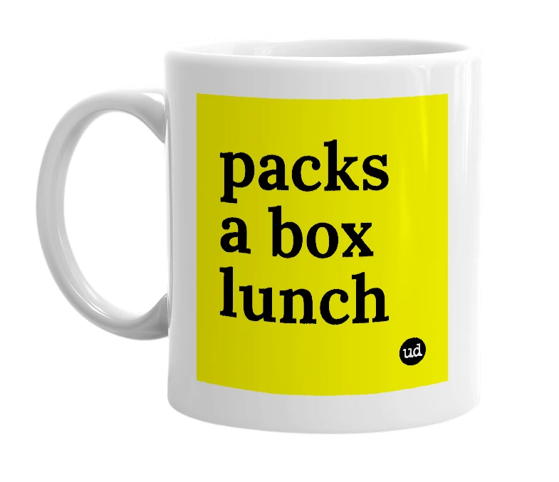 White mug with 'packs a box lunch' in bold black letters