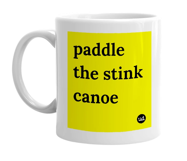 White mug with 'paddle the stink canoe' in bold black letters