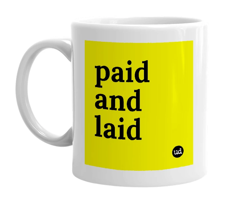 White mug with 'paid and laid' in bold black letters